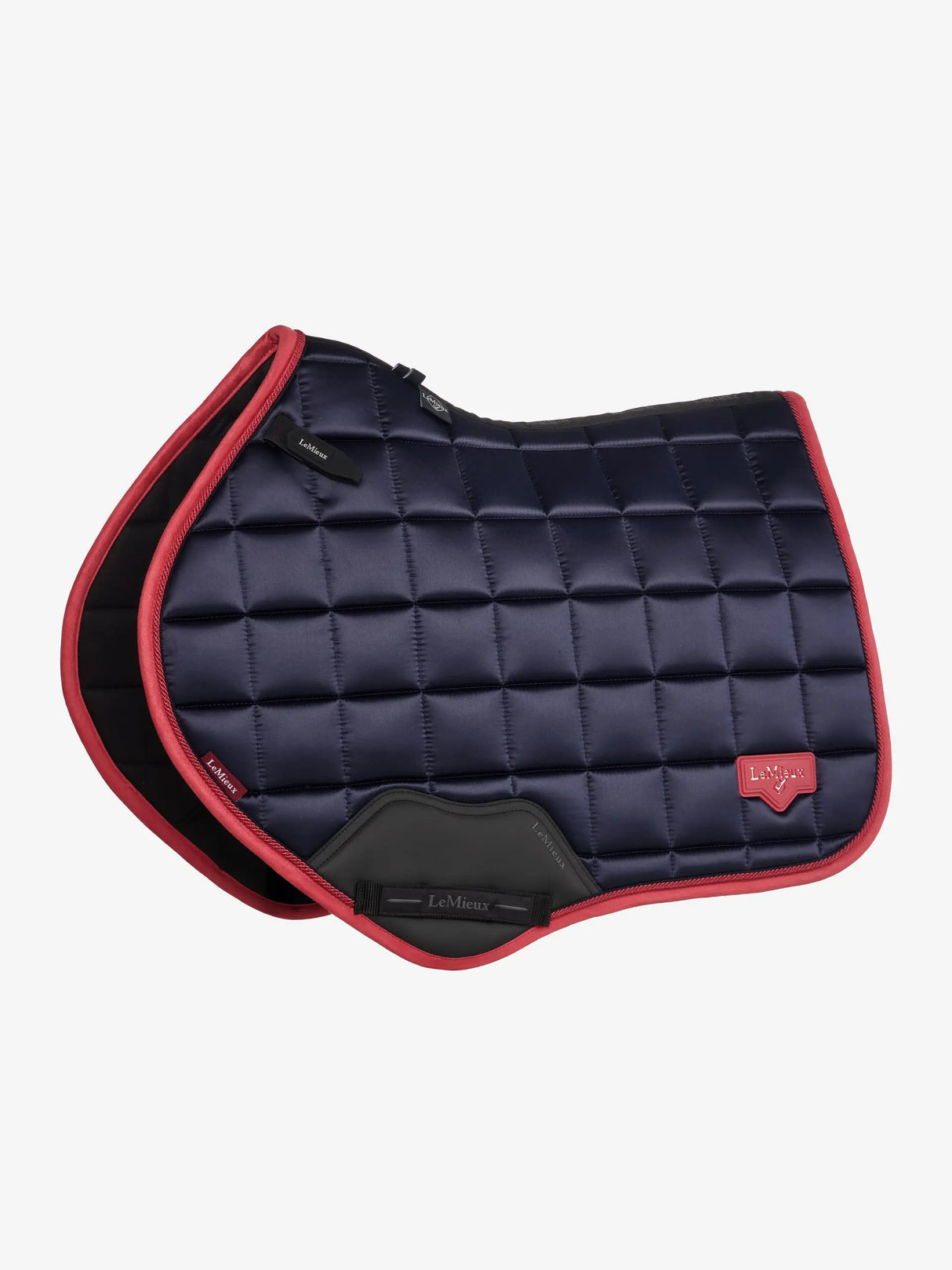 Navy blue quilted saddle pad with red border on a white background
