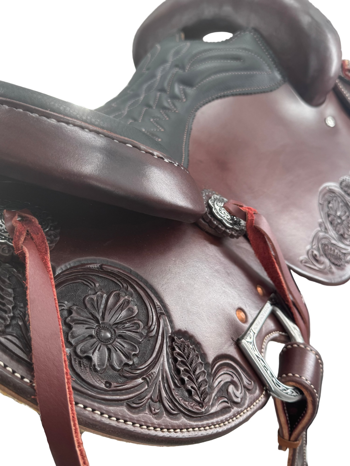 Floral tooled skirt detail on dark oil Western Dressage Saddle