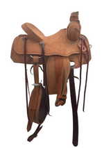 Rough out roping saddle