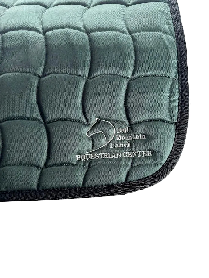 Contoured English Saddle Pad with Bell Mountain Logo. Hunter Green with silver stitching.