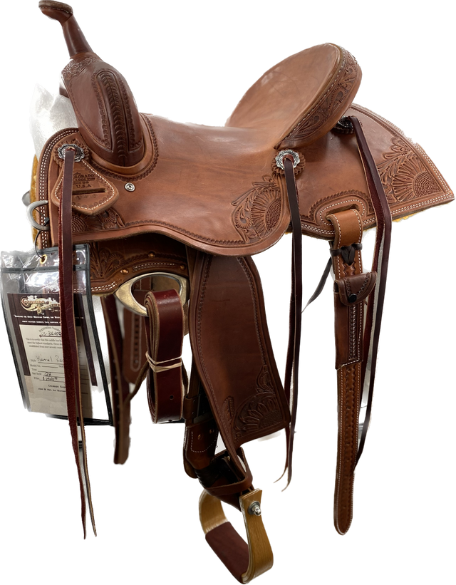 A brown Barrel Racer saddle designed for competitive barrel racing, featuring a lightweight design, deep seat, high cantle, and premium leather construction.