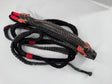 A traditional Brazilian bull riding rope designed for left-handed riders, featuring a tightly braided construction with a firm riser, secure handhold, and well-stitched block. The rope is primarily black with red accents.