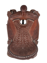 Western saddle with brown suede stitched seat
