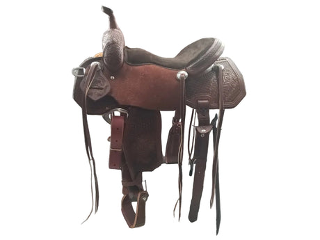 A brown leather  Barrel western saddle 