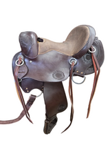 14' Endurance Saddle with chocolate brown color and sunflower tooled accents