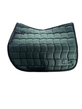 Contoured English Saddle Pad with Bell Mountain Logo. Hunter Green with silver stitching.