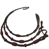 Dark Romel Reins with Red Rawhide
